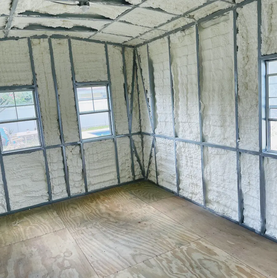 Closed-cell spray foam insulation applied to wall cavities in a residential project in Sheffield Lake